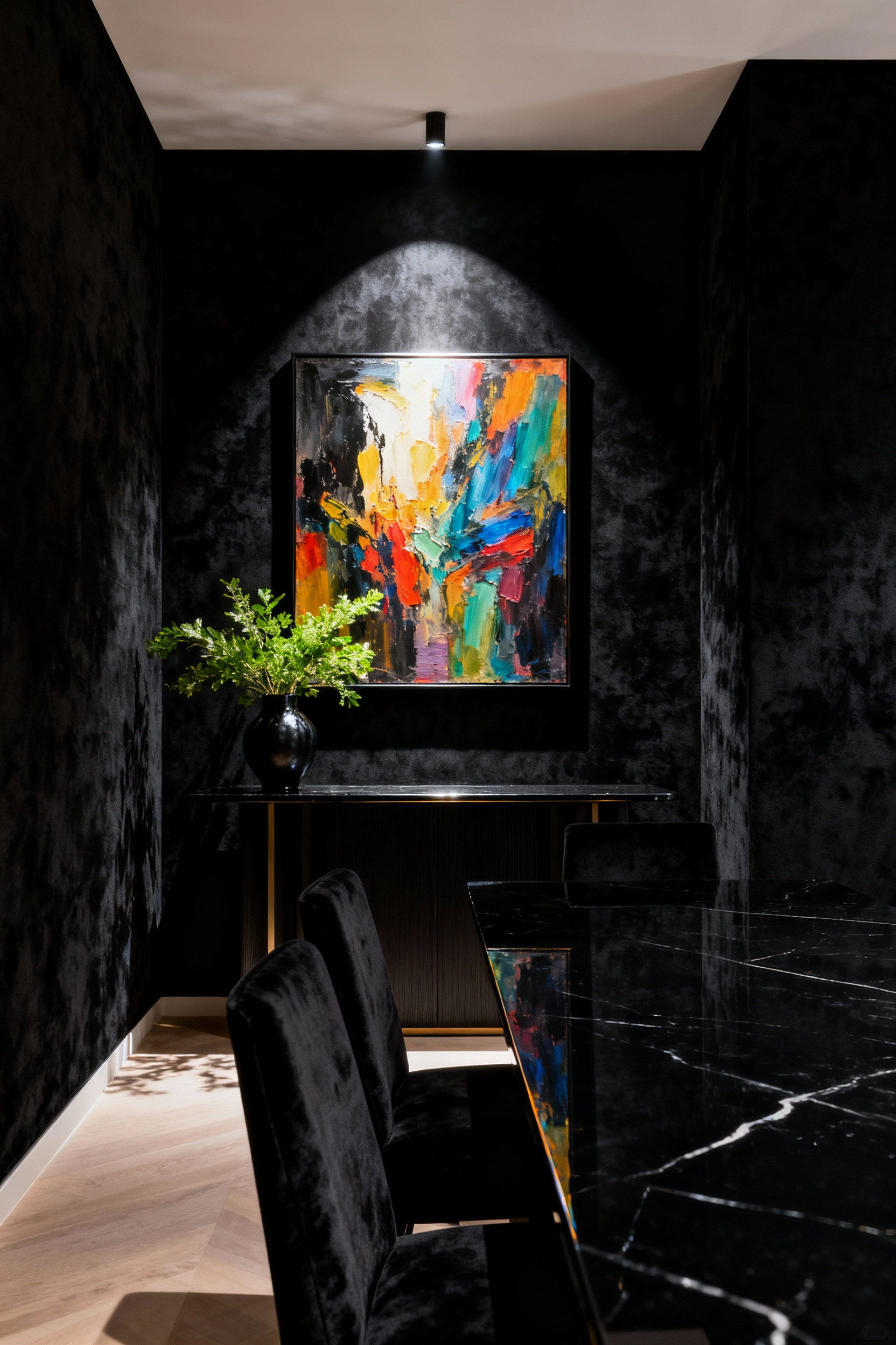 Luxurious black dining room with contrasting matte and high-gloss walls, dramatic lighting highlighting vibrant abstract artwork, creating an immersive, intimate atmosphere. Item #4 on black dining room walls.