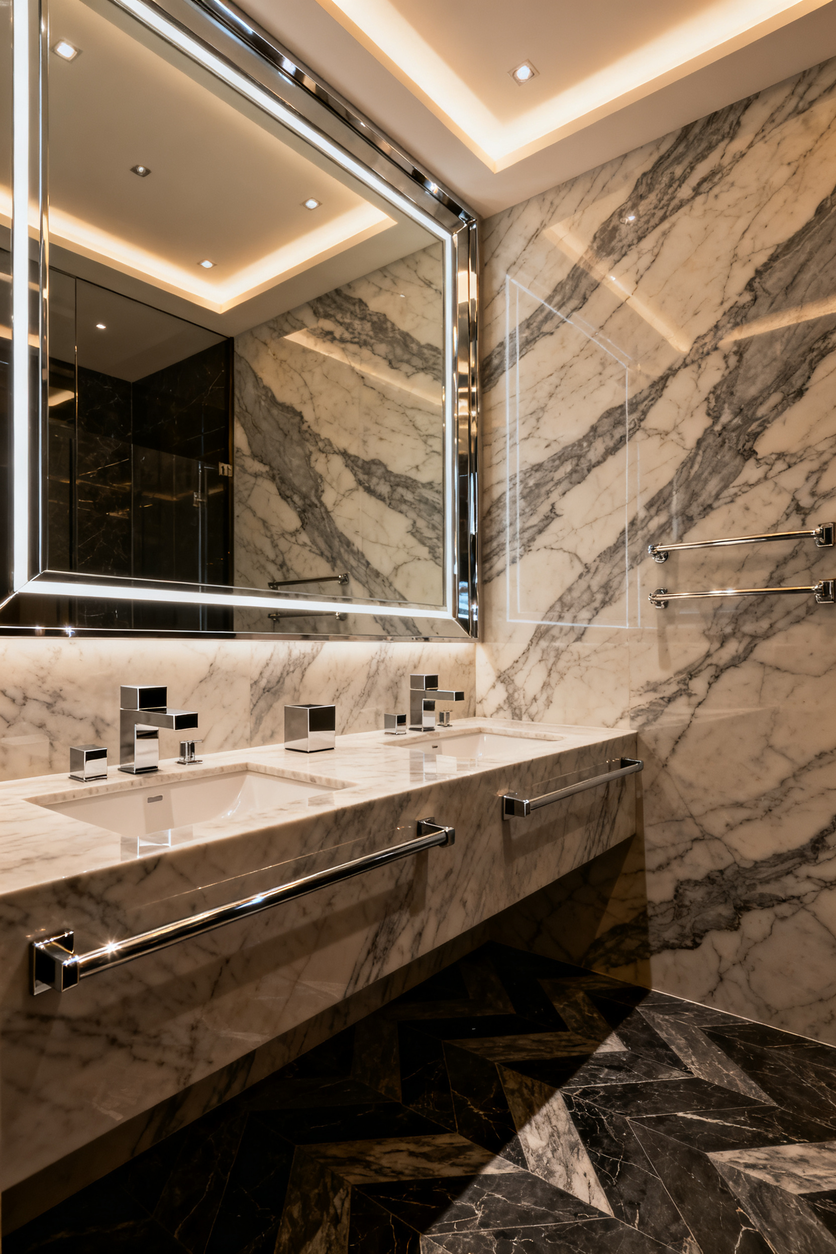 Luxurious Art Deco bathroom featuring high-contrast design, pairing large-format Statuario marble walls with highly polished chrome fixtures and a dark chevron-patterned floor.